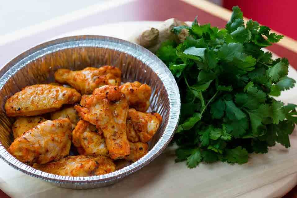 Tandoori hot wings with fresh cilantro